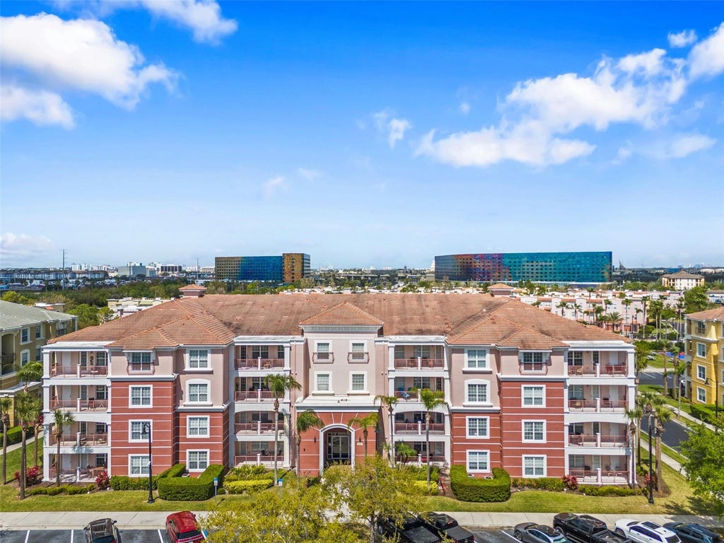 Photo of 5037 Shoreway Loop #202, Orlando, FL 32819 (MLS # O6443079)