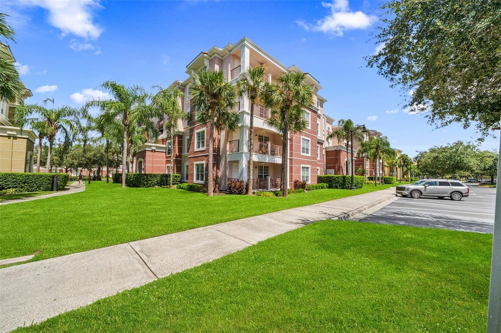 Photo of 5037 Shoreway Loop #202, Orlando, FL 32819 (MLS # O6443079)