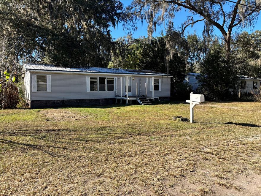 Great location near Silver Springs State Park!  1993 3/2 doublewide, 1296 square feet.  Metal roof 2000.  HVAC 2005.  Needs some TLC.  Newer shed in the back yard. *Seller is personal representative of the estate and has no independent knowledge with respect to the condition of the property.*