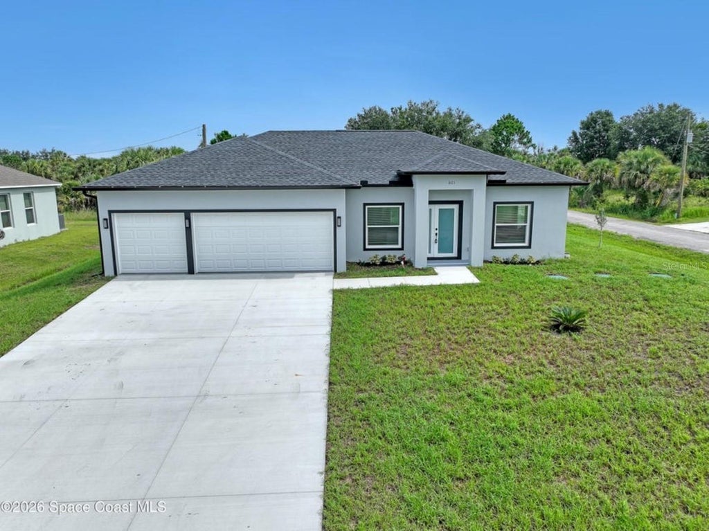 Photo of 601 Yardley Street SW, Palm Bay, FL 32908 (MLS # O6422922)