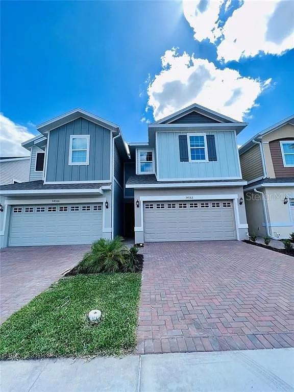 Photo of 34162 Cinder Way, Wesley Chapel, FL 33545 (MLS # TB8553496)