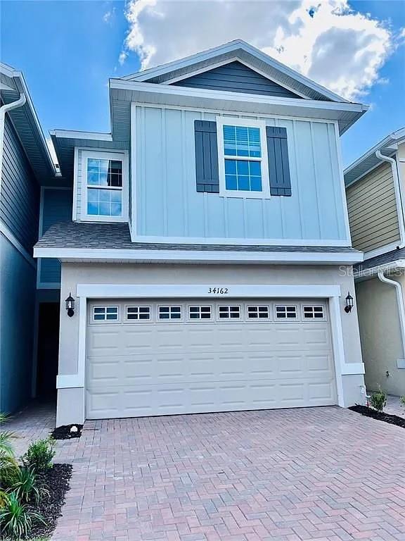 Photo of 34162 Cinder Way, Wesley Chapel, FL 33545 (MLS # TB8553496)