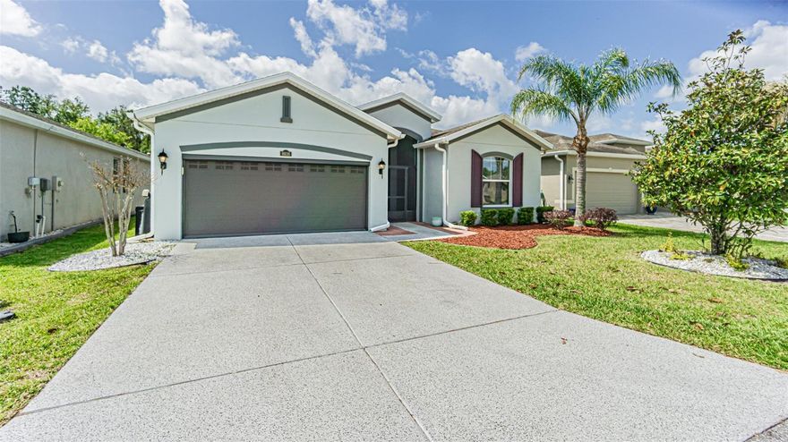 Here's a beautiful 2014 K. Hovnanian Homes, 1.707 square foot home in the highly desirable Tampa Bay Golf and Country Club community. This home features high ceilings, ceramic tile everywhere but two bedrooms which have carpet. Large kitchen with solid wood, tall cabinetry, granite, a tasteful back-splash and stainless steel appliances.  This home is 100% move-in ready. The large, two car garage has a utility sink, overhead storage and an electric roll-down garage screen. The bathrooms offer high vanities with granite, modern fixtures and more. TBG&CC has two incredible golf courses, the 18-hole Championship course and a 9-hole executive course. The golf courses here are impeccable and very well-maintained. Tampa Bay Golf & Country Club is Tampa Bay's premier active 55+ community featuring two swimming pools (the large resort-style pool has fountains and is heated to a balmy 80 degrees). Pickleball, tennis, cards, bocce, shuffleboard, cornhole, and more activities than anyone could possibly do! Our new activities center has a HUGE fitness center with state-of-the-art fitness equipment, a beautiful billiards room, and an amazing card room. TBG&CC has no CDD and very affordable HOA charges, which include Cable/Internet/DVR and Mini Box. The Tampa Bay Golf & Country Club is Tampa Bay's most desirable 55+ Active community. All room sizes are approximate and should be confirmed by buyer(s).