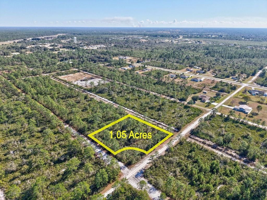 Photo of 123 Camellia Drive, Indian Lake Estates, FL 33855 (MLS # TB8460603)