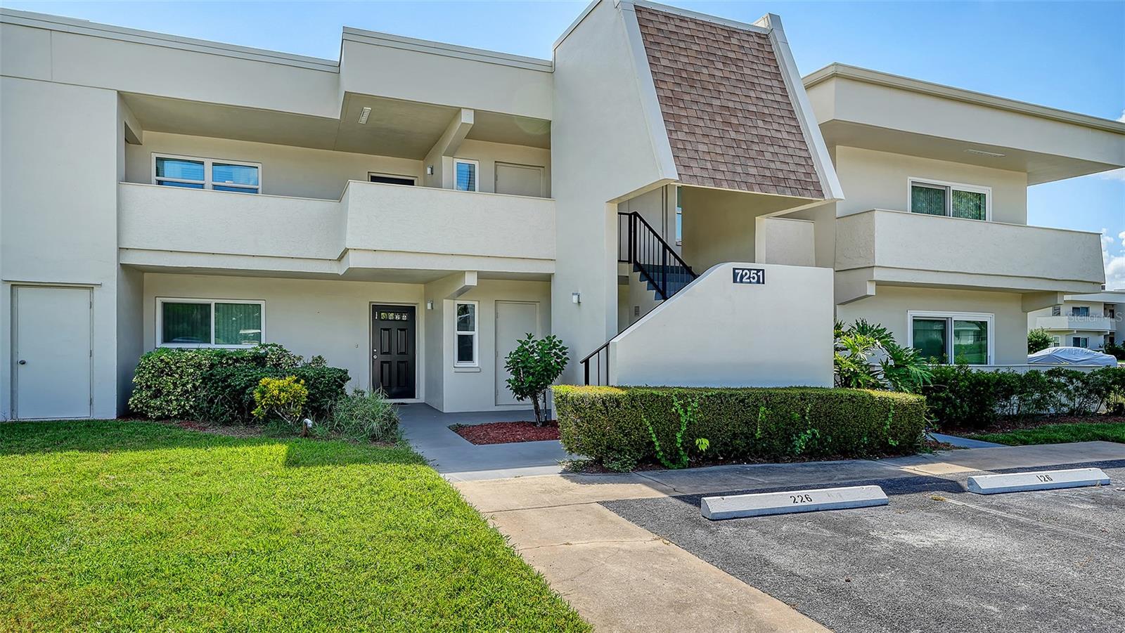 Highly sought after 2 Bedroom and 2 Bath Condo with fabulous water and golf course views of the Champions Course of the Palm Aire Country Club. This super clean, updated and remodeled condo is being offered Turnkey Furnished. The tiled Living Room/Dining Room combo is great for entertaining or just relaxing. The two Bedroom en-suites have their own private baths, both updated and remodeled in 2019. PGT Impact Windows were also added in 2020 and 2021. Primary Bedroom has separate mirrored make-up counter and walk-in closet. Kitchen has granite counter tops, designer glass backsplash, newer appliances, eat-in area and separate entrance. Both entrances have folding screen doors to bring refreshing cross breezes throughout the condo. Other notable updating: Roof of building and Air Handler replaced in 2019. Washer/Dryer and Refrigerator in 2020. Air Conditioner in 2021. Designer Ceiling Fans and Living Room Furniture in 2023. Newer sliding glass doors enclose the porch/lanai, perfect for your year round enjoyment. This condo is an excellent investment opportunity with either annual or seasonal rentals, $18,000 in seasonal (6 months) rentals this coming season with existing potential renters. Palm Aire CC is offering specials for Golf, Sports and Fitness and Social Memberships, however memberships in the club are not mandatory. Convenient location close to the UTC Mall, Benderson Rowing Venue, Sarasota Airport and the local beaches.