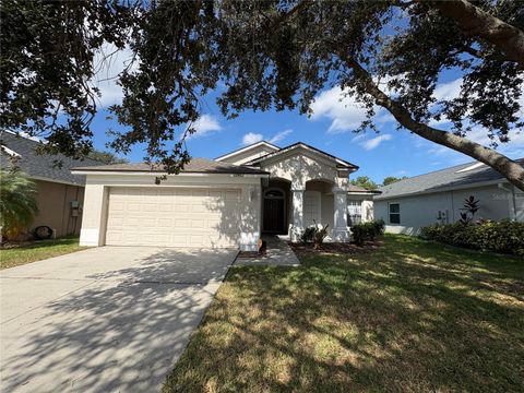 Photo of 12412 Cedarfield Drive, Riverview, FL 33579 (MLS # TB8440862)