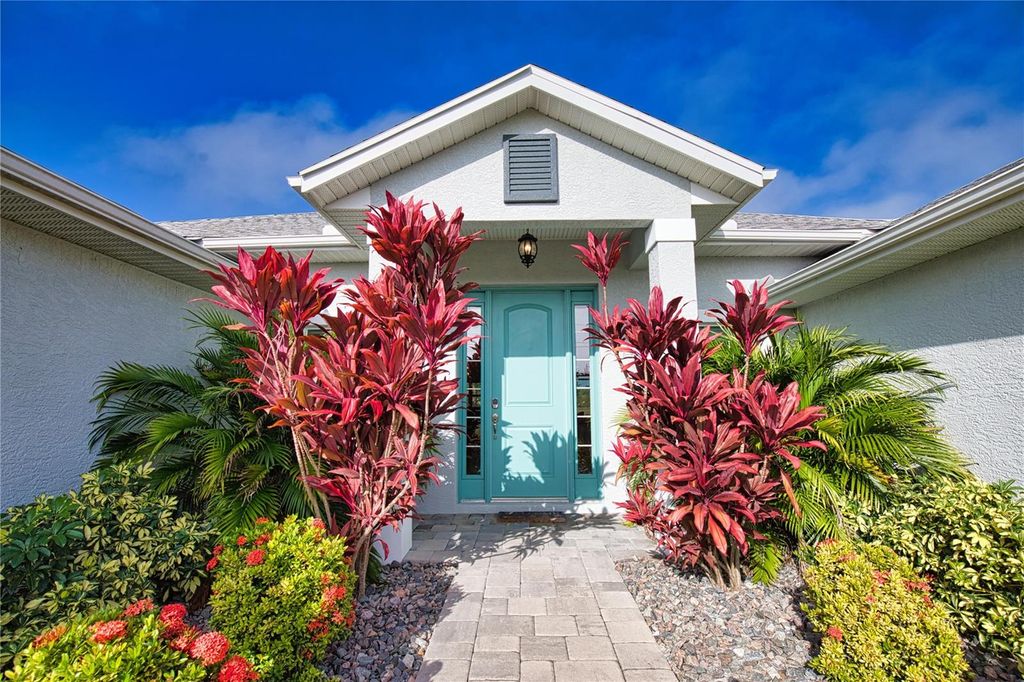 Photo of 916 Boundary Boulevard, Rotonda West, FL 33947 (MLS # O6356630)