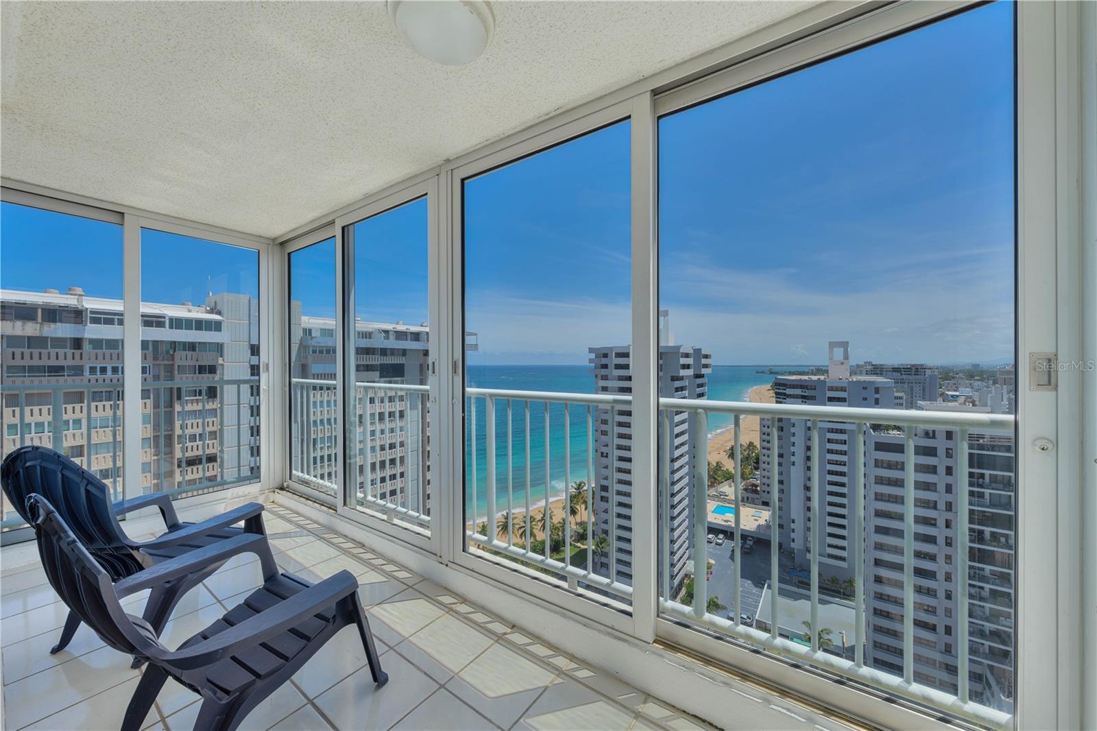 Experience an exclusive metropolitan lifestyle within the heart of Condado Beach in San Juan. This contemporary two-bedroom, two-bathroom apartment offers an unparalleled opportunity to experience coastal living with breathtaking views. The approx. 1,345 Sq. Ft. residence features an open-concept living and dining area that flows seamlessly towards the fully-equipped kitchen and a light-filled sunroom affording magnificent panoramic views of the Atlantic Ocean. The well-appointed primary bedroom is ensuite for added ease and convenience. One assigned parking space rounds out this property. Torre del Mar is a boutique building that enjoys a prime location within close proximity to renowned restaurants, entertainment venues, shopping options and the beach. Residents have exclusive access to premier amenities such as 24-hour security, swimming pool, game room, fitness center and tennis courts. CoBe is known as one of San Juan’s most esteemed and highly-regarded communities. A short drive away from Old San Juan and its numerous historic landmarks. Also nearby the Miramar Arts District and Isla Verde.