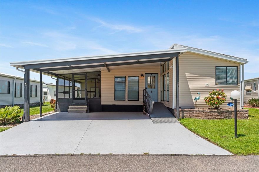 Move-in ready! Some furnishings included! This 2 bed 2 bath home has updates with all new siding, baseboards, carport, 2 YEAR OLD VAPOR BARRIER and a 2019 roof–a sweet deal in this sought-after location!! With the best amenities, clubs, and selection of activities you’ll find in any co-op park around–and located on the banks of the Myakka river–Lazy River Village is one of the premiere (if not THE best) 55+ waterfront manufactured parks in all of Sarasota and Charlotte county! 

With cathedral ceilings, bright walls, and handsome laminate flooring, this home’s classy, chic interior will accommodate any decor or stylings of your choosing. The spacious master bedroom leads to a well-lit master bath featuring a double-sink counter and glass-door shower. In the kitchen, multiple large windows allow plenty of light to reveal a sleek kitchen island with drawers & eating area, as well as plenty of solid surface counter space and windows near the sink. A bright, open living room/dining area leads out, through sliding doors, to a shaded deck that provides the perfect spot to sit and enjoy beautiful Florida evenings while taking cover from heat and bugs. 

This home is the perfect seasonal place to enjoy Florida's coveted gorgeous winters and a perfect year-round home for those who love all 4 seasons of Florida. If you enjoy an abundance of activities, you will have plenty to choose from in Lazy River Village: Pickleball, tennis, bike clubs, card clubs, and pontoon boating. They even have a professional woodworking shop. A low monthly fee of $276 includes all the amenities. There are other amenities for an extra fee, such as a marina slip if your home is not located on the water. 

One of the things that makes Lazy River Village so great is its proximity to...well...everything! Be prepared to enjoy Florida's wildlife at its finest, both inside the Lazy River Village complex and at abundant state parks and nature preserves. Shopping and dining surround you in all directions. The spring training homes of both the Atlanta Braves & the Tampa Bay Rays are just minutes away. The world-renowned Gulf beaches are all within 30 minutes or less! 1) Englewood beach, 2) Casperson Beach (GREAT for shelling), 3) Venice Beach (shark tooth capital of the world), 4) Brohard Paw Park, 5) Nokomis beach (you've GOT to experience the weekly drum circles), 6) the island gem of southwest Florida: Boca Grande... And finally: 7) Siesta Key in Sarasota has been ranked multiple times as the number one beach in the nation and is a mere 35 minutes away. Lazy River Village offers a lifestyle that every retiree dreams of. You have the quaint downtowns of Venice and Punta Gorda--both cities are often ranked as Top 10 destinations in the country for retirement. Another local favorite, Englewood, is a cozy, fun beach town on the Gulf. 

The residents of Lazy River Village agree: Lazy River is a community that offers it all. Don't miss your chance to see this home!