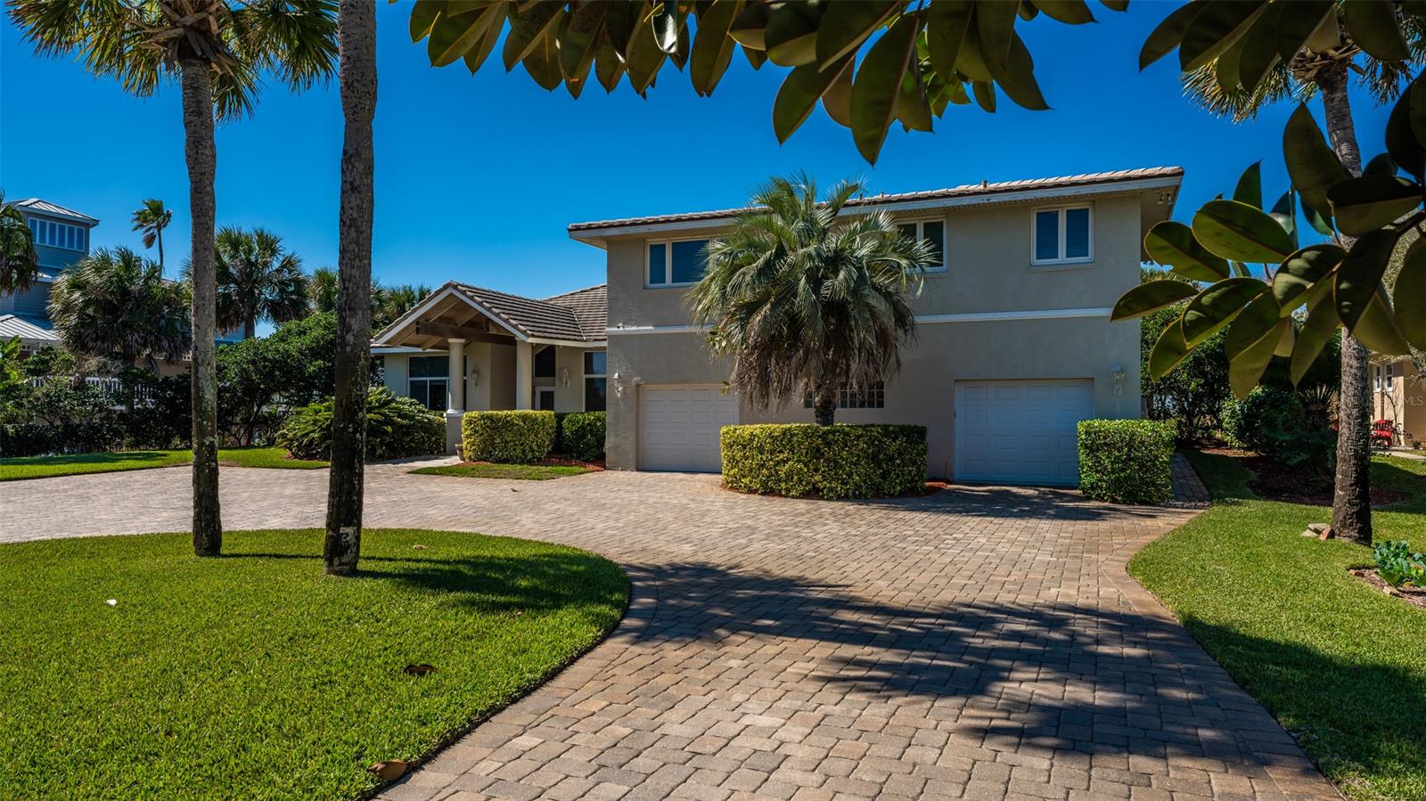 This gorgeous waterfront pool home on the Intracoastal Waterway has a fantastic proximity to the Inlet by boat and Flagler Ave by golf cart or bike! Location is as good as it gets...a private cove with deep-water dockage, nestled across from wooded greenspace, .6 mile to Flagler Ave, and just two blocks to the beach access. 4 bedrooms, 5 ½ baths, a home office, and a newly added space off the large kitchen that would be perfect for your 2nd office or wine room. The 4,557 sq foot home has soaring ceilings and two ground floor master suites, both opening onto the newly renovated pool and spa, with outdoor kitchen and amazing views of the Intracoastal. Two large second level bedrooms are privately located away from the main space with full bathrooms off each bedroom. The layout of this home is spacious yet private, perfect for entertaining or quiet enjoyment! The main living room boasts 16-foot-wide sliding glass doors that open to pool and Intracoastal views sunsets. Cook in your large gourmet kitchen from the Jenn-Aire gas cook top and store all your kitchen desires in the 48" cabinets and full pantry! A second living space off the kitchen provides for relaxation by the electric fireplace. The oversized two-car garage is approximately 1,000 sq ft, has 10 feet ceilings and a bonus space to park your golf cart. Don't forget the upgrades: The pool and spa have a new travertine pool deck, stone outdoor kitchen, and new pool screen enclosure. Gorgeous acacia hardwood floors were added in the dining, office and bedrooms. New AC’s were installed in 2020, tankless water heater added in 2018 and a water filtration, softener and purifier in 2019. The home has central vacuum, easy for cleanup! This is a MUST SEE if you are in search for a beautiful home on the Intracoastal!! ;Water: City