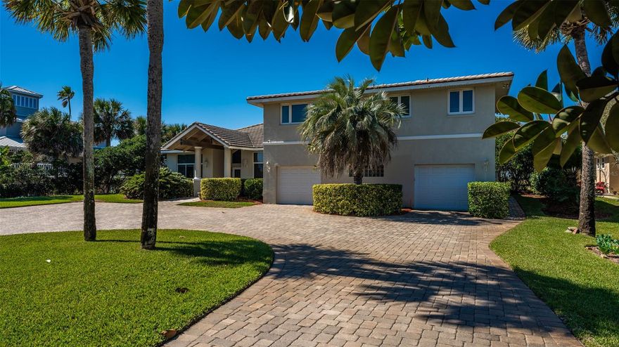 This gorgeous waterfront pool home on the Intracoastal Waterway has a fantastic proximity to the Inlet by boat and Flagler Ave by golf cart or bike! Location is as good as it gets...a private cove with deep-water dockage, nestled across from wooded greenspace, .6 mile to Flagler Ave, and just two blocks to the beach access. 4 bedrooms, 5 ½ baths, a home office, and a newly added space off the large kitchen that would be perfect for your 2nd office or wine room. The 4,557 sq foot home has soaring ceilings and two ground floor master suites, both opening onto the newly renovated pool and spa, with outdoor kitchen and amazing views of the Intracoastal. Two large second level bedrooms are privately located away from the main space with full bathrooms off each bedroom. The layout of this home is spacious yet private, perfect for entertaining or quiet enjoyment! The main living room boasts 16-foot-wide sliding glass doors that open to pool and Intracoastal views sunsets.  Cook in your large gourmet kitchen from the Jenn-Aire gas cook top and store all your kitchen desires in the 48" cabinets and full pantry! A second living space off the kitchen provides for relaxation by the electric fireplace. The oversized two-car garage is approximately 1,000 sq ft, has 10 feet ceilings and a bonus space to park your golf cart. Don't forget the upgrades: The pool and spa have a new travertine pool deck, stone outdoor kitchen, and new pool screen enclosure. Gorgeous acacia hardwood floors were added in the dining, office and bedrooms. New AC’s were installed in 2020, tankless water heater added in 2018 and a water filtration, softener and purifier in 2019. The home has central vacuum, easy for cleanup! This is a MUST SEE if you are in search for a beautiful home on the Intracoastal!! ;Water: City