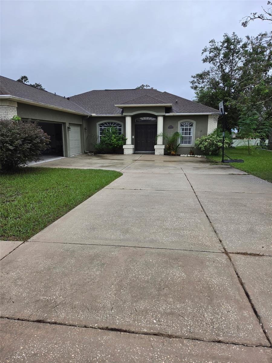 Photo of 1201 Overland Drive, Spring Hill, FL 34608 (MLS # TB8556145)