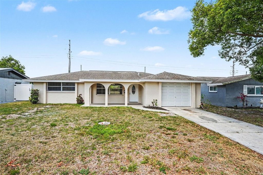 Photo of 7037 Magnolia Valley Drive, New Port Richey, FL 34653 (MLS # O6403934)