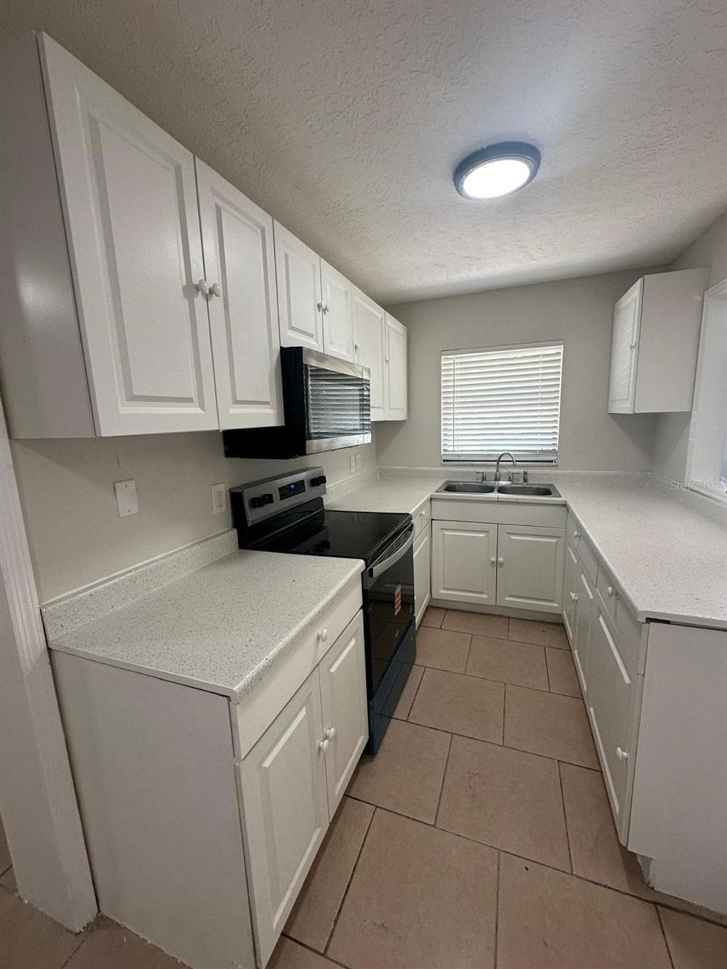 Photo of 7207 Harwick Dr, Orlando, FL 32818 (MLS # O6406450)