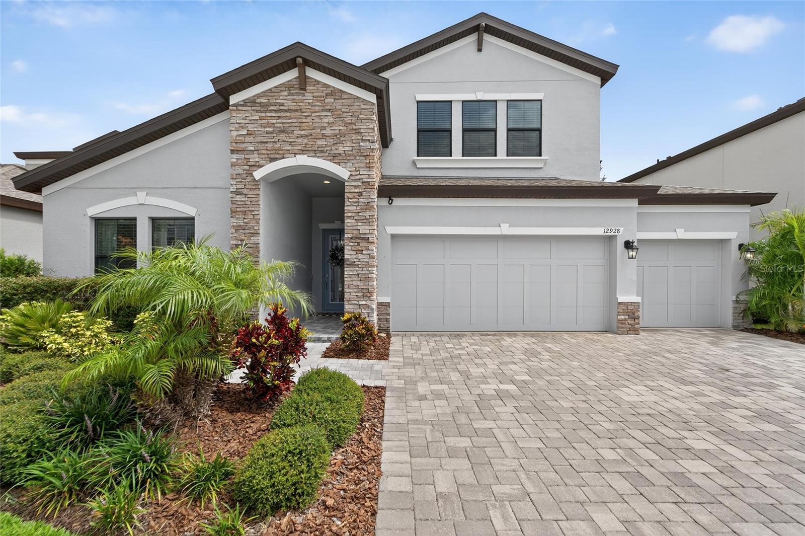 ONE OF A KIND AND PRICED TO SELL! Discover the perfect blend of LUXURY and your own PERSONAL PARADISE, in this Hyde Park IV POOL home built by WestBay. Step inside to find a BRIGHT, open layout enhanced by wood-look LVP flooring that flows seamlessly from the extended foyer into the grand room, gourmet island kitchen, and café dining area. The CHEF'S KITCHEN shines with GE appliances, Sonoma Duraform Linen cabinetry with satin nickel pulls, Calacatta Quartz countertops, a designer backsplash, and a sleek Arbor faucet—perfect for everyday living and entertaining alike. The attached GRAND ROOM features OVERSIZED SLIDING DOORS that lead to your own backyard oasis. Escape to your luxurious owner’s retreat featuring a spa-inspired en-suite with double vanities, an oversized walk-in shower, and a massive walk-in closet. The home also includes two additional LARGE bedrooms on the first floor, along with two additional FULL bathrooms (one is also a convenient POOL BATH) a beautifully designed laundry room and a practical mud-room leading into the home from the 3-car garage. The UPSTAIRS BONUS ROOM and private guest suite offer flexible living space for multi-generational living, extended family, visitors, or work-from-home needs. The real SHOW-STOPPER is the RESORT-LIKE heated saltwater POOL and SPA, expansive patio, and lush, mature landscaping that provides both privacy and breathtaking pond and conservation views. As a resident of Triple Creek, you’ll have access to incredible amenities including two clubhouses, multiple resort-style pools, tennis and basketball courts, fitness centers, scenic walking and biking trails, and more! Don’t miss your chance to own this luxurious home with the perfect mix of indoor comfort and outdoor serenity!