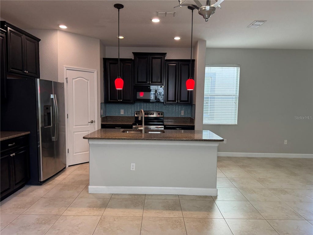 Photo of 15025 Evergreen Oak Loop, Winter Garden, FL 34787 (MLS # O6433081)
