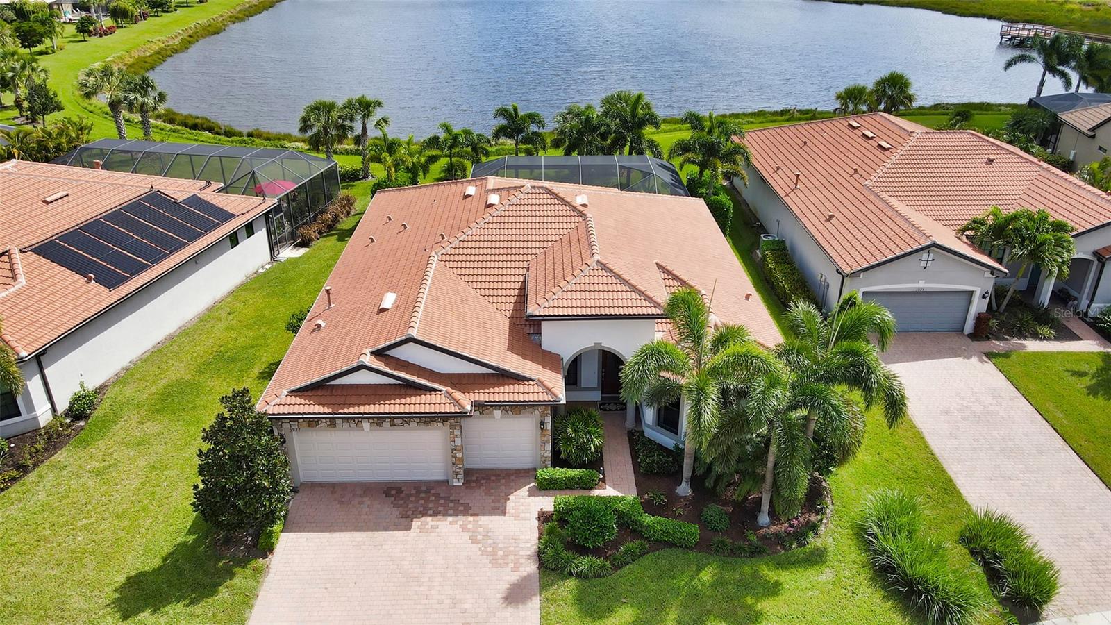 Amazing & expansive water views on this popular Pinnacle floor plan in Sandhill Preserve on Palmer Ranch* This beautiful maintenance free home features 3 bedroom plus office* Upgraded wood look tile throughout living area with wood floors in all bedrooms & den* Master bedroom with tray ceiling & walk in closet* Gourmet kitchen with white cabinets, quartz counters, upgraded stainless appliances, gas stove & new dishwasher* Stepping out to the paver brick lanai you are greeted by 2 water features, a Zen garden & a picture frame screen with majestic unobstructed water views* The great room has disappearing wall sliders leading to lanai* Hurricane shutters for lower insurance costs* 3 car garage*A furniture package is also available at additional cost* Sandhill Preserve is one of Palmer Ranch's newer communities with only 308 homes* The community features a community pool, jacuzzi, fitness center, pickle ball, club house, fire pit, barefoot bar area tennis & more. Located in the heart of Palmer Ranch just minutes from world famous Siesta Key beach, shopping, restaurants & Legacy bike trail*