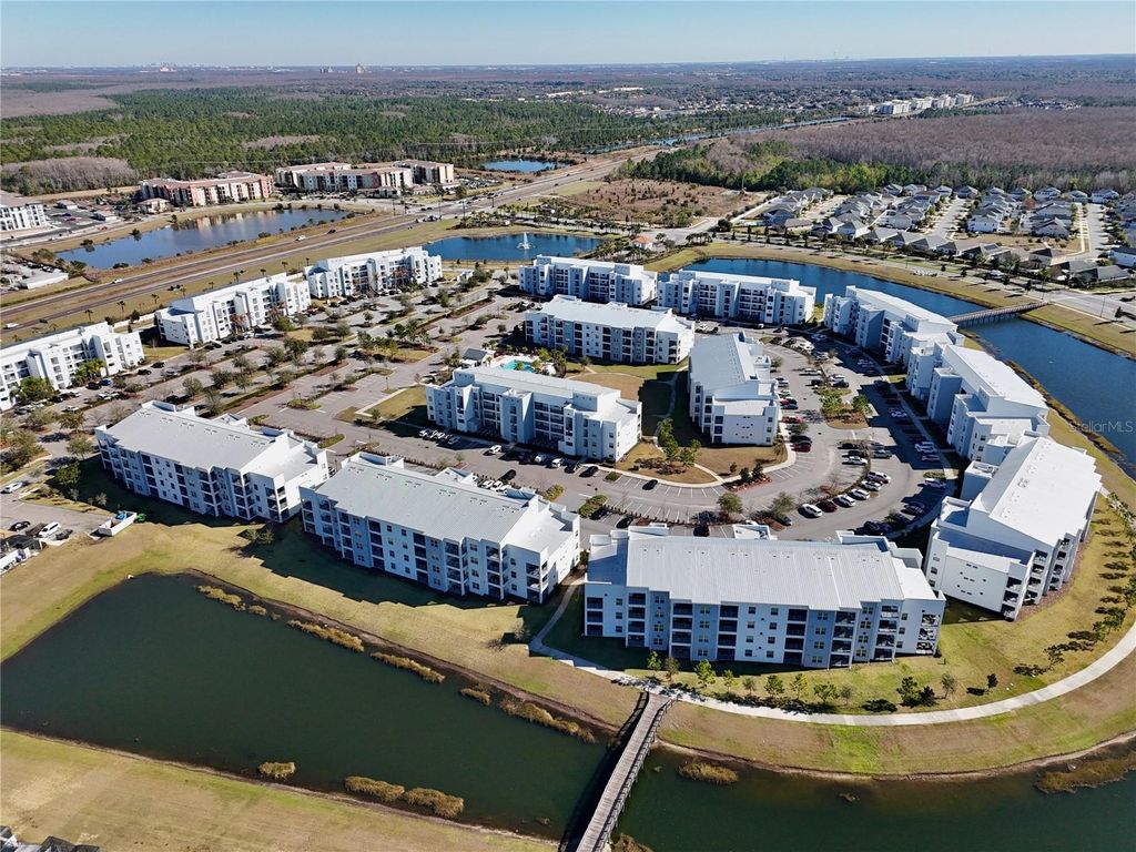 Photo of 3121 Paradox Circle #301, Kissimmee, FL 34746 (MLS # O6403226)