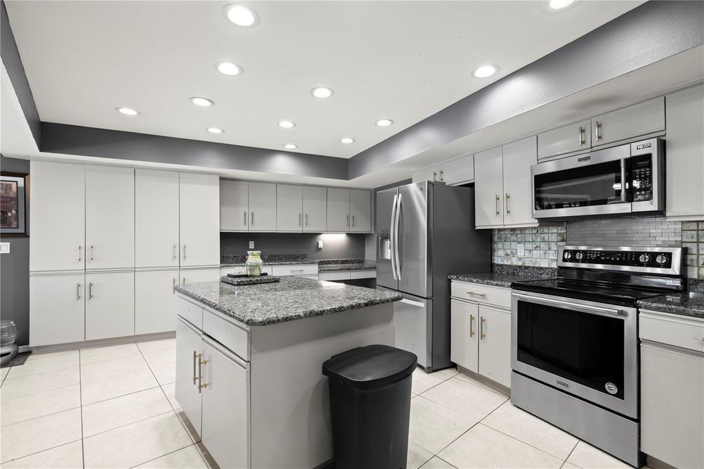 Photo of 14947 Lake Forest Drive, Lutz, FL 33559 (MLS # TB8489442)