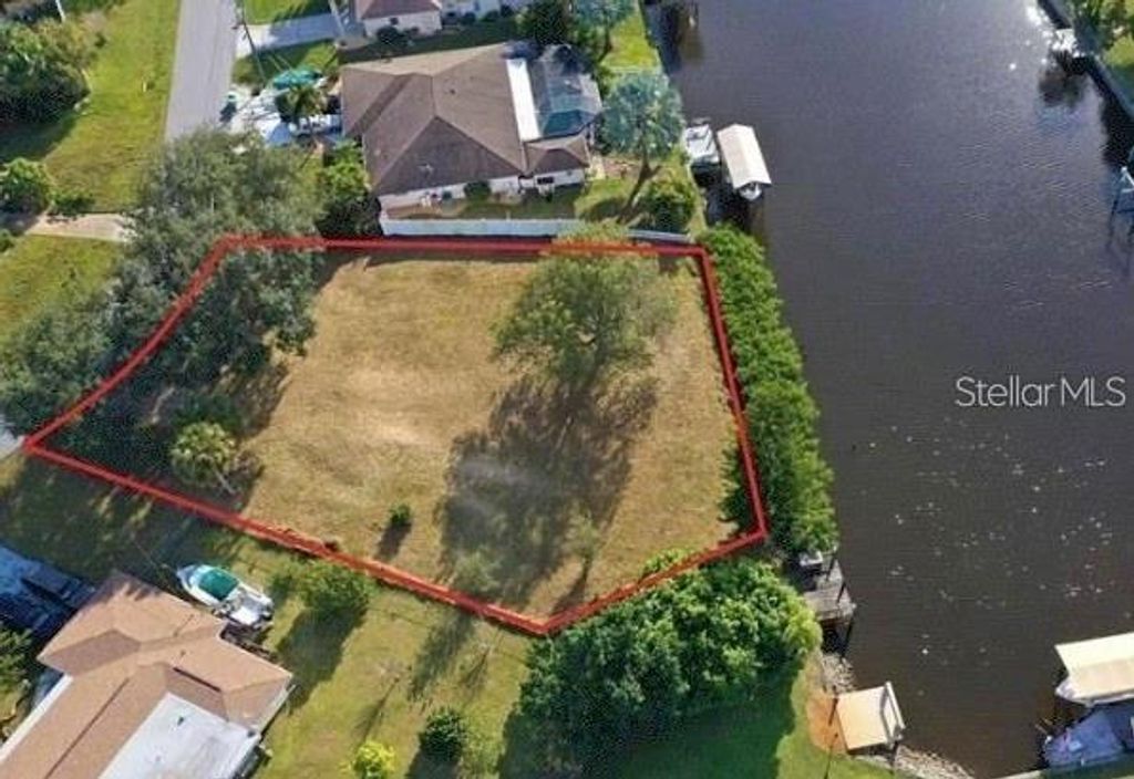 Photo of 550 E Tarpon Boulevard NW, Port Charlotte, FL 33952 (MLS # C7508156)