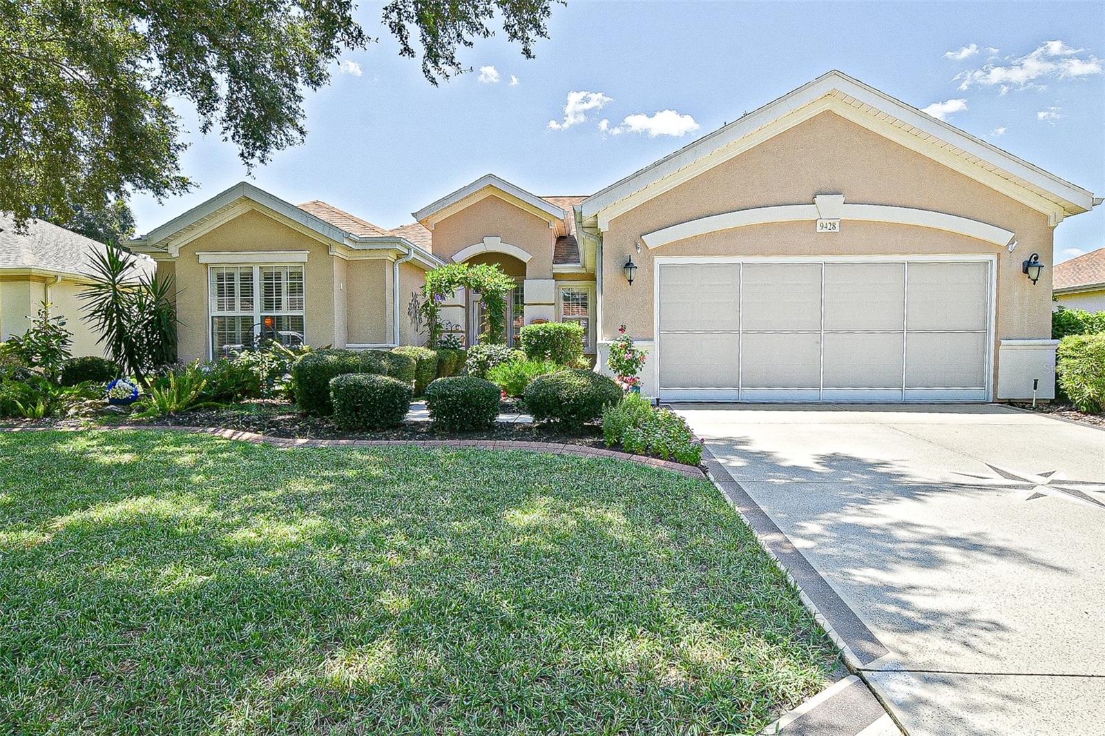 RARELY AVAILABLE POOL (SALTWATER W/HOT TUB) HOME IN WONDERFUL DEL WEBB SPRUCE CREEK GOLF AND COUNTRY CLUB A 55 PLUS COMMUNITY WITH MANY CLUBS AND ACTIVITIES. PRIVACY ABOUNDS IN YOUR OWN POOL PARADISE AND LARGE LANAI. MADEIRA MODEL BOASTS TWO BEDROOMS AND TWO BATHS, PLANTATION SHUTTERS AND THE GUEST BATH SHOWER AREA HAS BEEN UPDATED AND THERE IS A MOVABLE TUB IN PRIMARY BATH/SHOWER. THE LARGE OPEN GREAT ROOM HAS A FORMAL DINING OR BONUS AREA, DINETTE AREA WITH A BAY WINDOW AND LARGE OPEN KITCHEN WITH NEWER STAINLESS-STEEL APPLIANCES AND GRANITE COUNTERTOPS AND LIGHT AND BRIGHT CABINETS. ALL OF THIS WITH OPEN VIEWS TO THE BEAUTIFUL POOL WITH HOT TUB AND LANAI. THE POOL CONTROLS ARE ACCESSIBLE FROM THE INSIDE OF THE HOME. BEDROOMS HAVE NEWER CARPET AND THE PRIMARY BEDROOM HAS A BAY WINDOW WITH UNDER WINDOW SEATING AND STORAGE. ROOF RE-SHINGLED (2020), HVAC (2014), TANKLESS WATER HEATER (2023)
THE EXTENDED GARAGE HAS A SCREEN AND PULL-DOWN ATTIC STAIRS AND STORAGE CABINETS. DON'T MISS THIS RARE OPPORTUNITY!