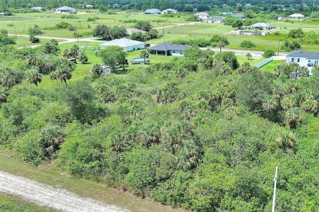 Photo of 1507 Hines Avenue, Lehigh Acres, FL 33972 (MLS # O6344053)