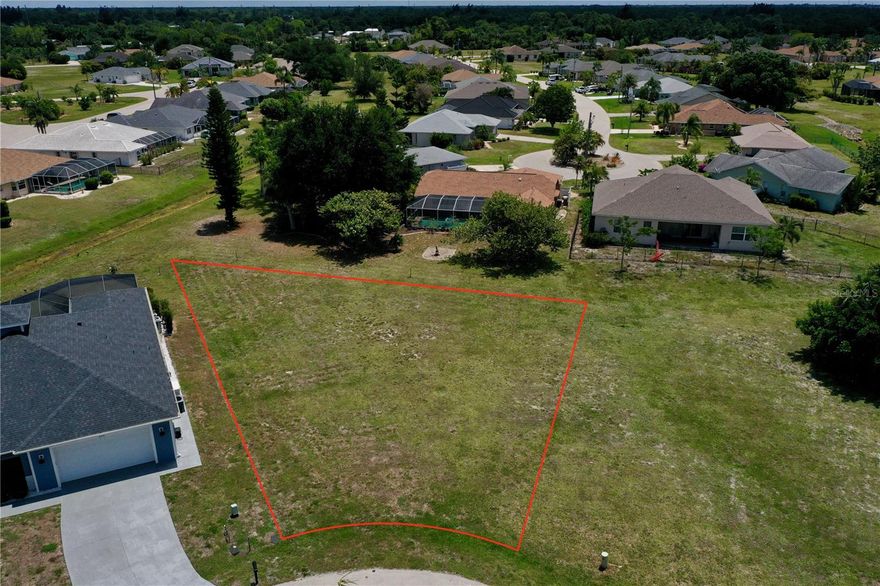 Build your Florida dream home on this prime .23-acre lot nestled at the end of a quiet cul-de-sac at 204 Yellow Elder, in the highly sought-after Deed Restricted community of Burnt Store Meadows. This 9,974-square-foot property offers a serene park-like setting with a beautiful Greenbelt view in the back, ensuring lasting privacy and a tranquil natural backdrop for your future custom lanai. Plenty of space to design a backyard oasis with a nice pool & outdoor kitchen, to enjoy the Florida sunshine. Build with confidence as the property sits in the coveted X flood zone where flood insurance is typically not required by lenders. Ready to Build with PUBLIC WATER and SEWER utilities already available at the site.
Just a short drive from US-41 and 10 minutes from I-75 for easy travel North & South throughout the state. For the avid golfer, you are surrounded Courses including nearby Twin Isles Country Club and the 27-hole championship course at Burnt Store Marina, plus numerous others. Baseball fans will love being just 20 minutes away from the excitement of the Tampa Bay Rays spring training at Charlotte Sports Park. Port Charlotte Town Center in Murdock is just down the road, offering a massive variety of shopping and dining options to suit every taste.

Nature lovers and beach seekers are spoiled for choice with the Charlotte Harbor Preserve State Park, Babcock Ranch Preserve, and the Fred C. Babcock/Cecil M. Webb Wildlife Management Area all nearby for world-class hiking and birdwatching. Have your toes in the sand at the pristine Englewood Beach or the upscale shores of Boca Grande in about 40 minutes, while the vibrant atmosphere of Fort Myers Beach is just a 50-minute drive away. The world-famous shelling and turquoise waters of Sanibel Island are only about an hour from your front door. Whether you are looking for a peaceful retreat or an active lifestyle, this exceptional lot in Burnt Store Meadows is the perfect place to start your next chapter.