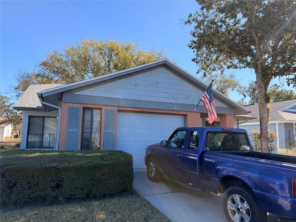 Photo of 11614 Rose Tree Drive, New Port Richey, FL 34654 (MLS # TB8486233)