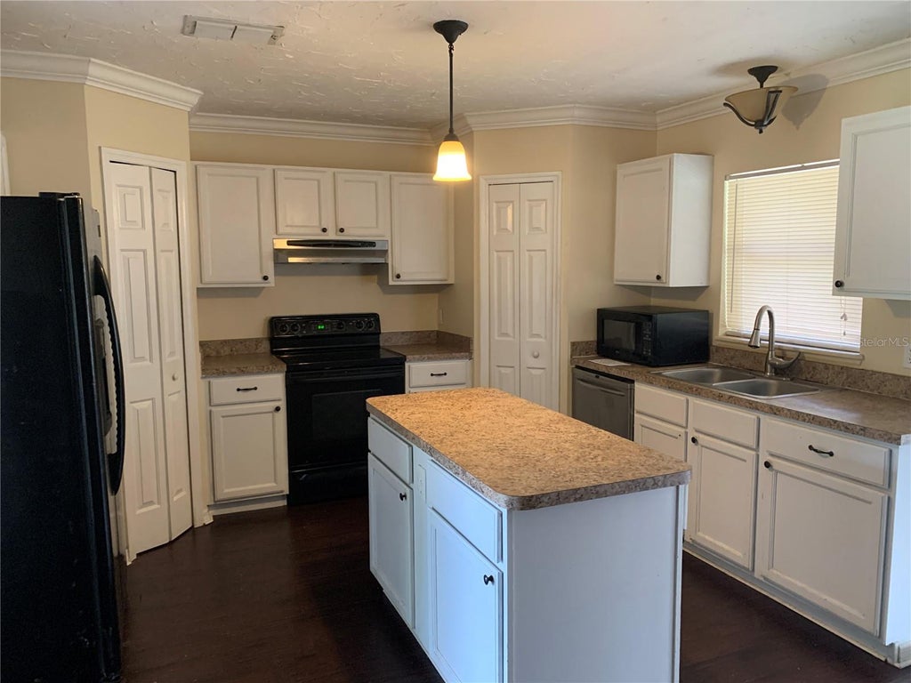 Photo of 4300 Iveyglen Avenue, Orlando, FL 32826 (MLS # O6415659)