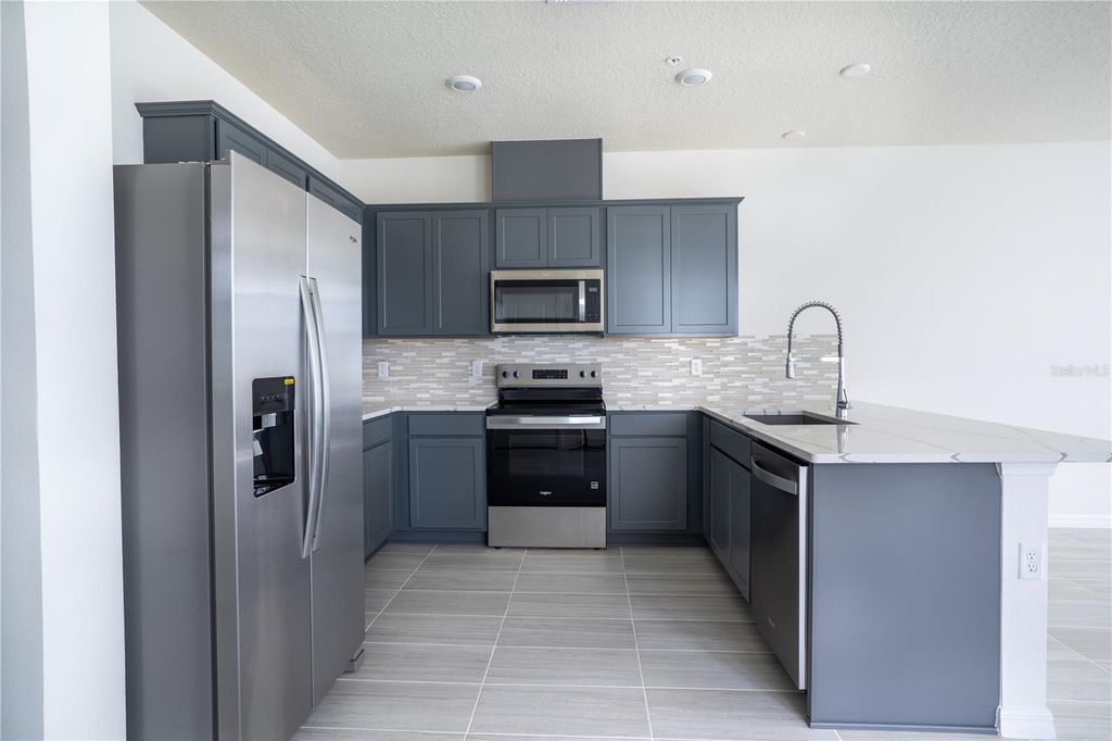 Photo of 4580 Maple Waltz Alley, Clermont, FL 34714 (MLS # O6413297)