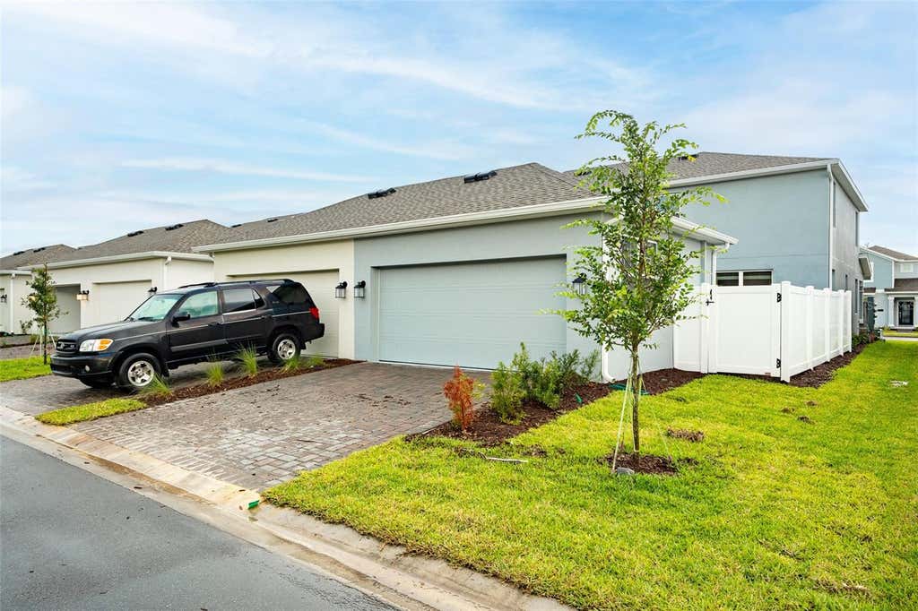 Photo of 11299 Listening Drive, Orlando, FL 32832 (MLS # O6421279)