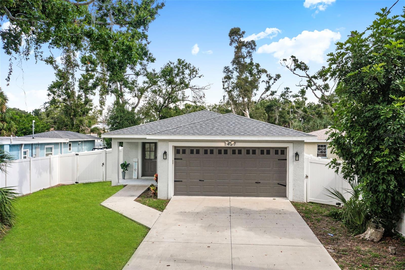 Fully furnished and ready for immediate occupancy, this 3 bedroom, 2 bathroom newer construction home offers the ideal Sarasota lifestyle. Located in the historic Central Cocoanut neighborhood of downtown Sarasota just minutes to Main Street, Rosemary District, The Bayfront and the Gulf beaches. Built in 2022, and designed with both comfort and convenience in mind, this residence features an open floor plan highlighted by vaulted ceilings, recessed lighting, and luxury vinyl plank flooring. The kitchen is a true centerpiece, showcasing granite countertops, shaker-style soft-close cabinets, subway tile backsplash, and Samsung stainless steel appliances, all flowing seamlessly into the dining and living spaces for effortless entertaining. The primary suite boasts a cathedral ceiling, walk-in closet, and private en-suite bath with a custom-tiled shower, while guest bedrooms are equally inviting. Step outside to a covered patio and expansive fully fenced backyard complete with fire pit, creating the perfect space to relax or host gatherings. Additional features include a spacious 2-car garage, hurricane shutters for peace of mind, and no HOA restrictions. Situated within Sarasota city limits where weekly rentals are allowed, this home presents a rare opportunity for investors or those seeking a turnkey primary residence or vacation retreat. Either way, it’s an opportunity with so much upside potential. With world-class dining, shopping, cultural venues, and pristine beaches just minutes away, this property is the complete package of style, location, and flexibility. **THIS PROPERTY QUALIFIES FOR A 1% LENDER INCENTIVE IF USING PREFERRED LENDER. INQUIRE FOR MORE DETAILS.**
