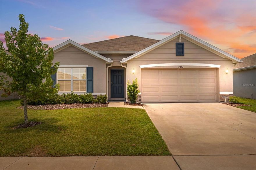 Tucked behind the gates of the Barrington neighborhood in Sterling Hill, this inviting D.R. Horton Cali model feels like home the moment you arrive. The charming stone-accented exterior and covered front entry welcome you inside, where a wide foyer opens into a bright, open-concept living space that effortlessly blends comfort and function. The heart of the home—the kitchen—features granite countertops, stainless steel appliances, white cabinetry, a spacious walk-in pantry, and a breakfast bar with a double sink, all designed to bring people together. A built-in coffee bar offers a cozy touch, perfect for quiet mornings or casual gatherings. The dining area and living room flow naturally, filled with soft carpet underfoot and bathed in natural light from sliding glass doors that open to a screened-in lanai—a peaceful retreat complete with shades and a ceiling fan, ideal for unwinding at the end of the day. The split floor plan offers privacy and calm, with the primary suite tucked away in the back, featuring dual walk-in closets and an ensuite bath with dual vanities and a step-in shower with supportive handrails. Each of the three additional bedrooms offers comfort, with one even boasting its own walk-in closet. Practical touches throughout, like the interior laundry room with overhead shelving, double-pane windows, and a wide hallway, make everyday living easy. Outside, the backyard is wrapped in vinyl privacy fencing on three sides and enhanced with an irrigation system and extra sprinklers—ready for play, pets, or gardening dreams. This sidewalk-lined, amenity-rich community offers a true sense of neighborhood with a clubhouse, pool, playground, fitness center, tennis and basketball courts, volleyball, dog park, and more. Located just 3.3 miles from the Suncoast Expressway, commuting to Tampa or surrounding areas is simple and stress-free. For leisure, Anderson Snow Park is just 2.4 miles away with sports fields and peaceful walking paths; Weeki Wachee Springs State Park is 8.5 miles away, offering kayaking, a natural spring-fed swimming area, and Buccaneer Bay—the only spring-fed waterpark in Florida, complete with waterslides, a lazy river, and sandy beaches; and Hernando Beach, just 12 miles away, offers waterfront dining and stunning sunset views—everything you need to feel at home, both inside and out.