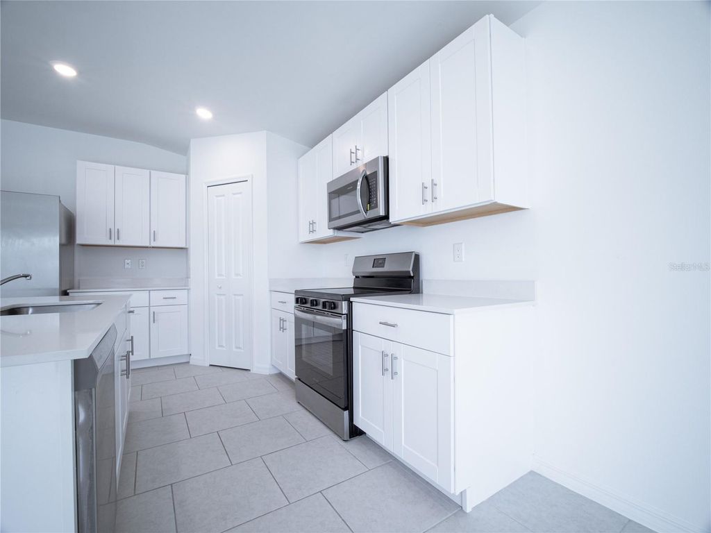 Photo of 2813 10th Street SW, Lehigh Acres, FL 33976 (MLS # C7521713)