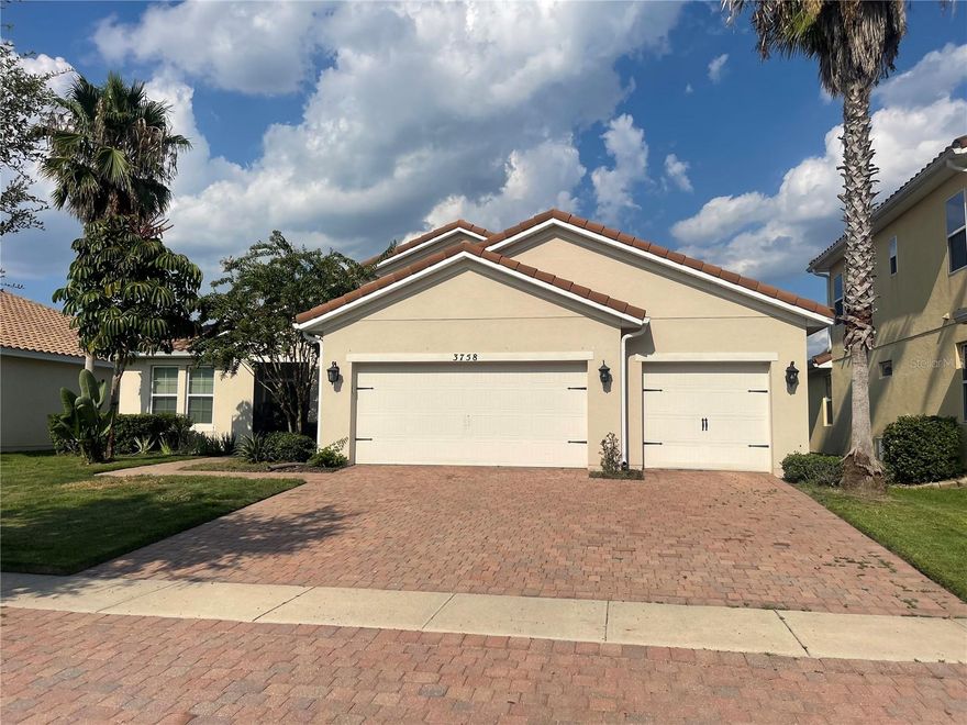 Don't miss your opportunity to live every day like you are on vacation! This 4-bedroom / 2-bathroom / 3-car garage home features an open layout, split bedroom floor plan with a walk-in laundry room. Located in the unique, gated, waterfront community of Bellalago! You will enjoy water access to Lake Toho, as well as community pools/spa, club house, fitness center with classes, tennis courts, basketball court, dog park, fishing club, community-sponsored events, Bellalago Academy K-8 charter school, and on-site restaurant! Bellalago is a beautiful blend of nature and luxury. Schedule a showing and come explore the neighborhood.
