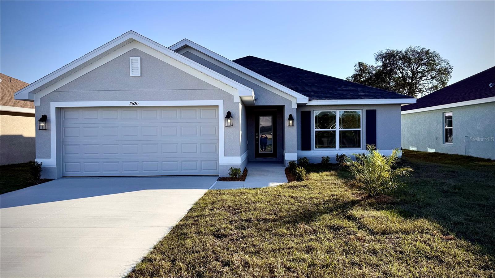 Under Construction. This new home in the gated community of Watercress Cove offers 3 bedrooms, 2 bathrooms, and 1,970 square feet of living space. Designed with an open floor plan, it features high ceilings and a spacious great room. The kitchen is equipped with granite countertops and stainless steel appliances, including a stove, microwave, and dishwasher. Porcelain tile flooring runs throughout the common areas, with cozy carpeting in the bedrooms. Conveniently located within a half-hour of our top Gulf beaches, this home provides easy access to shopping, schools, and more, all with the benefit of low HOA fees.