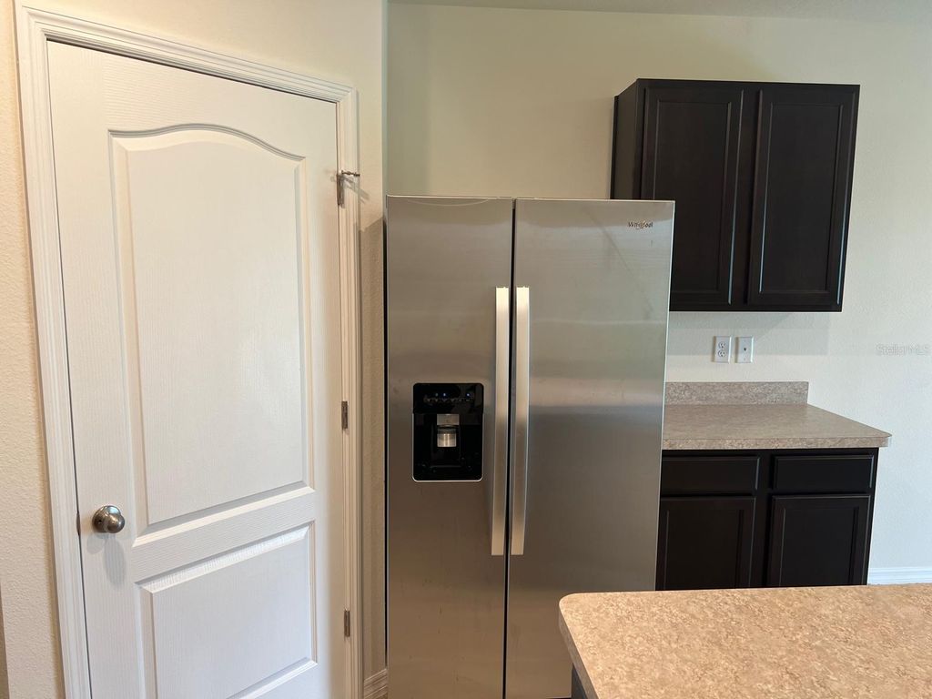 Photo of 1807 Silverbell Loop, Haines City, FL 33844 (MLS # O6380847)