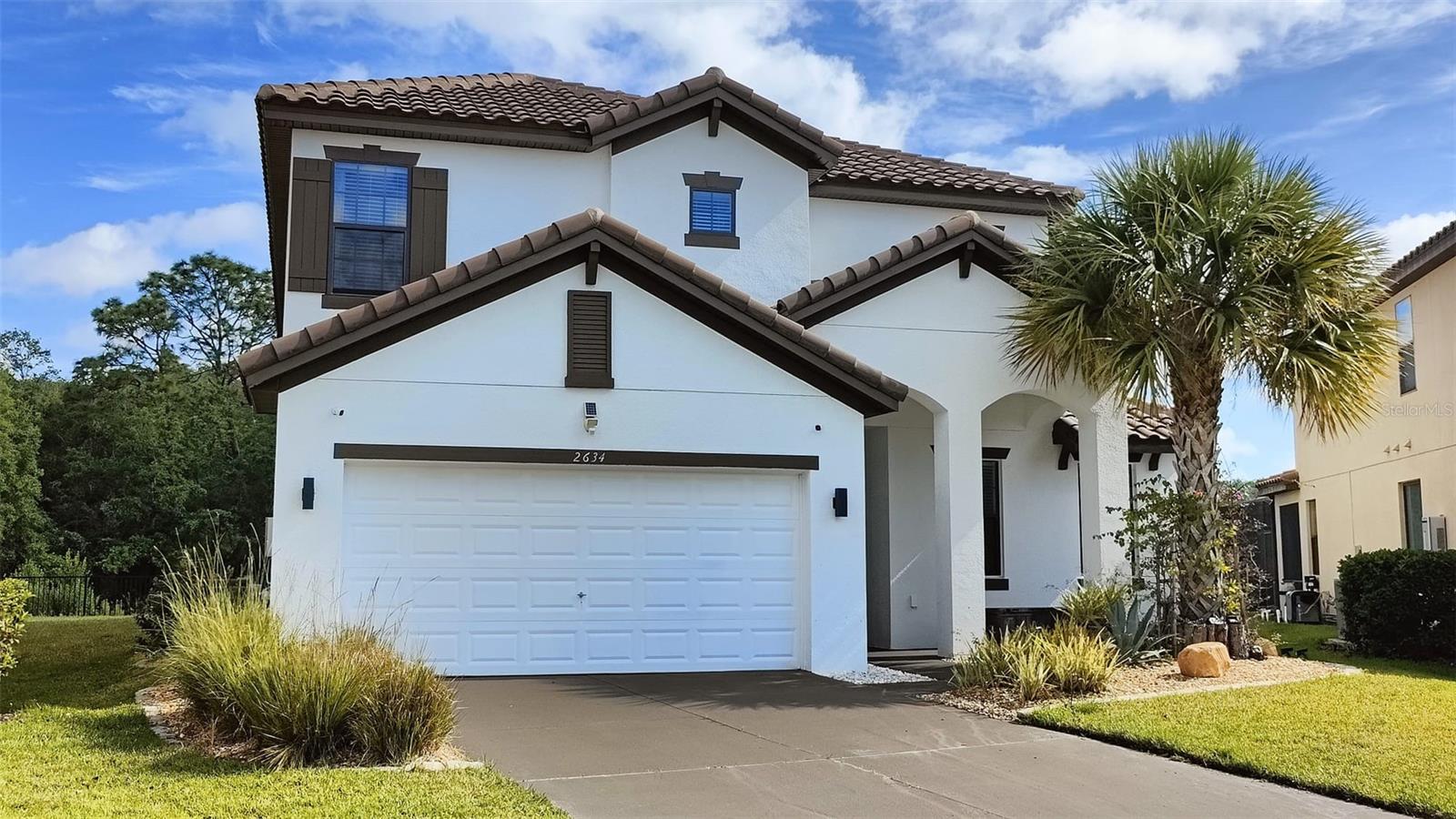 Welcome to Casa Blanca, a beautifully furnished 6-bedroom, 5-bathroom home in the gated resort-style community of Veranda Palms in Kissimmee. Just minutes from Disney, shopping, and dining, this spacious residence offers a peaceful lifestyle surrounded by nature. Features include an open layout, standard kitchen with appliances, Gym and themed bedrooms. The home boasts ultra-modern, high-grade wood flooring and plush level 5 carpet in all bedrooms for maximum comfort. Enjoy your private screened-in heated pool with stunning views of the nature preserve and lake. Ideal for families seeking a long-term rental that feels like a retreat, Casa Blanca offers comfort, privacy, and resort-style living with nature right in your backyard.