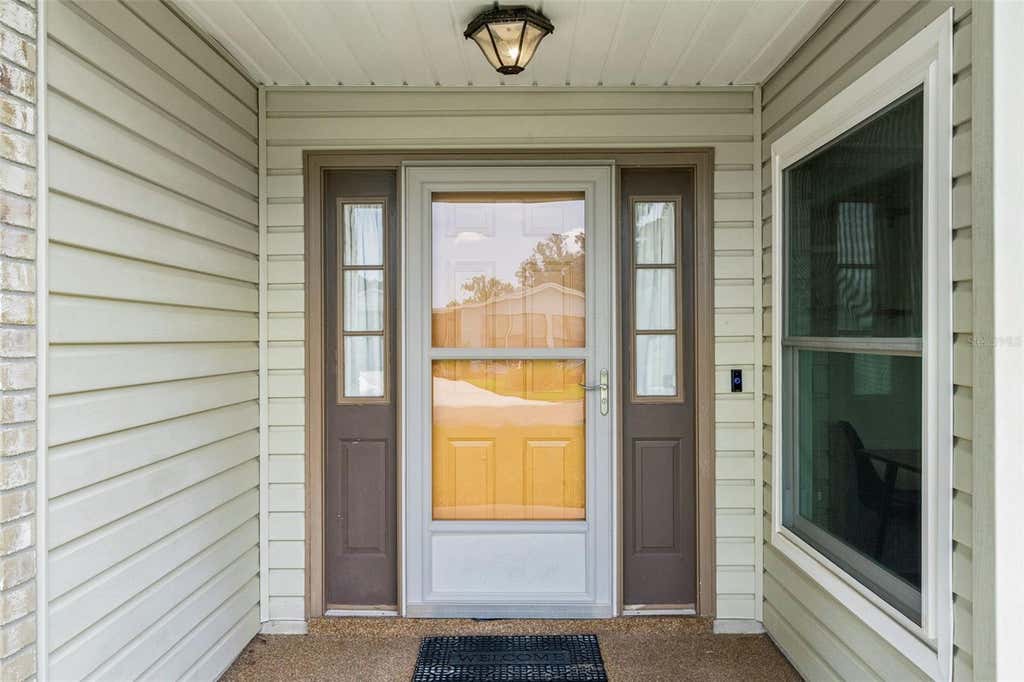 Photo of 5081 El Destino Drive, Leesburg, FL 34748 (MLS # G5113375)