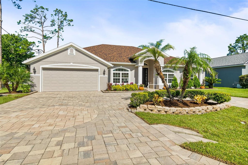 Photo of 116 Eric Drive, Palm Coast, FL 32164 (MLS # FC319751)