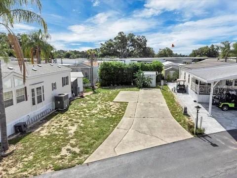 Photo of 502 Par Pines Boulevard, Davenport, FL 33837 (MLS # O6439670)