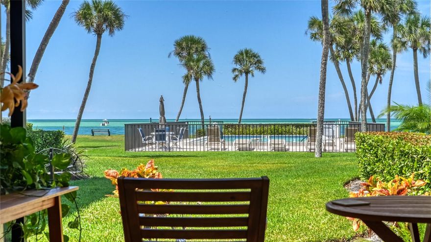 ***SEASON OR LONG TERM RENTAL*** Turnkey furnished waterfront condo in the desirable Sea Village community. Enjoy stunning views of Big Pass and the Gulf, plus easy access to the  community pool. The home features travertine flooring, crown molding, hurricane-rated sliders, plantation shutters, and an open living/dining layout. The kitchen includes wood cabinetry, granite countertops, a breakfast bar, and quality appliances.

The primary bedroom offers lanai access and an updated en-suite bath with dual sinks and a walk-in shower. The guest bedroom and bath are also well-appointed. A spacious lanai with travertine flooring and clear-view screening extends to an outdoor patio with wide water views. Impact-rated glass throughout for added peace of mind.

Located on the north end of Siesta Key, just moments from Siesta Key Village, beaches, dining, and Sarasota amenities—an ideal coastal rental.