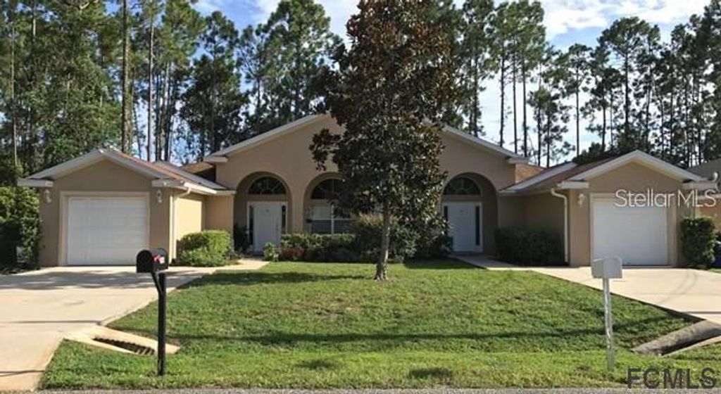 Photo of 23 Brunswick Lane #A, Palm Coast, FL 32137 (MLS # FC318161)