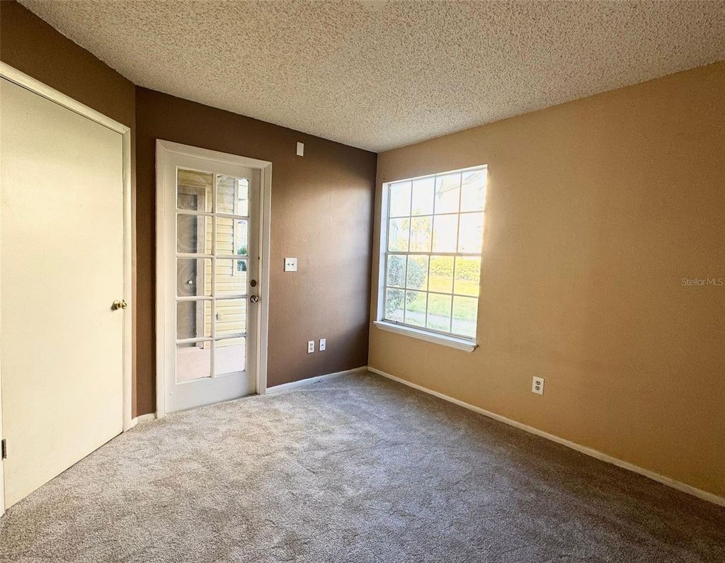 Photo of 1940 Lake Atriums Circle #107, Orlando, FL 32839 (MLS # O6404460)