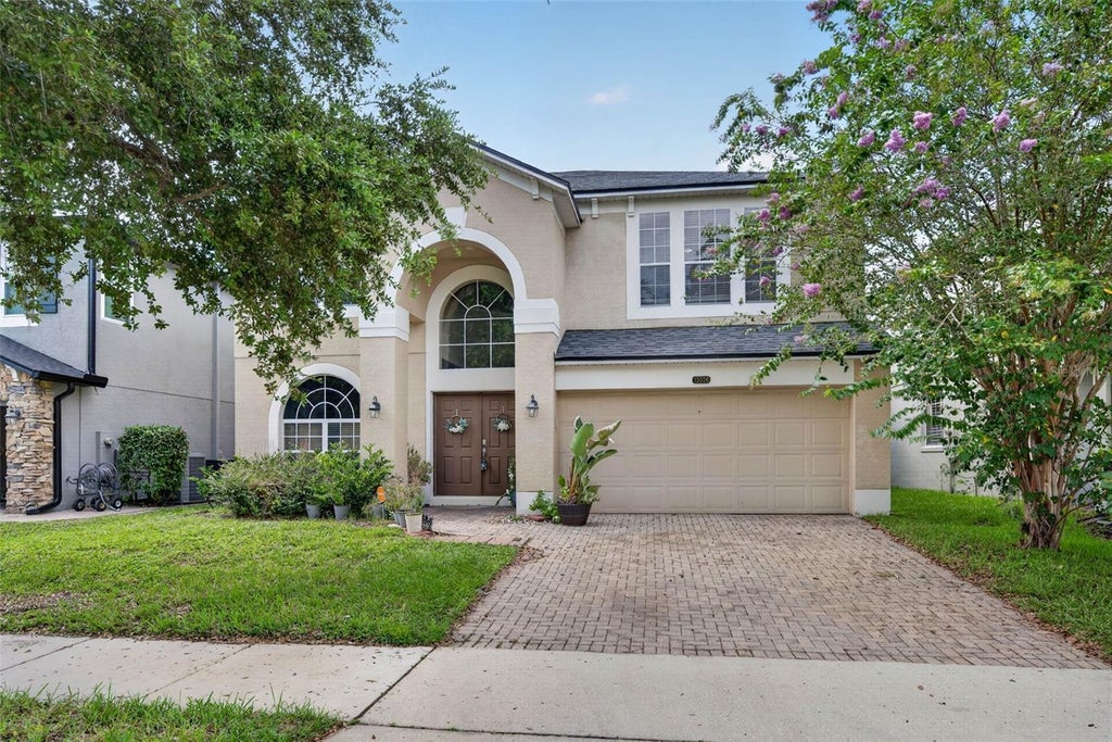 Photo of 13026 Moss Park Ridge Drive, Orlando, FL 32832 (MLS # O6450251)