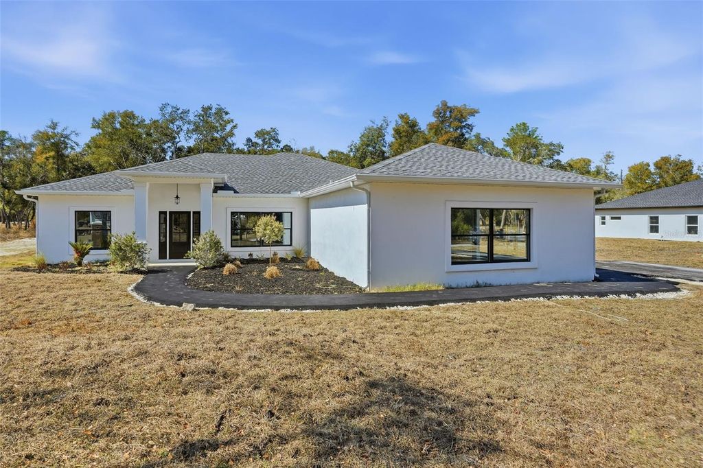 Photo of 34111 August Avenue, Webster, FL 33597 (MLS # W7883707)