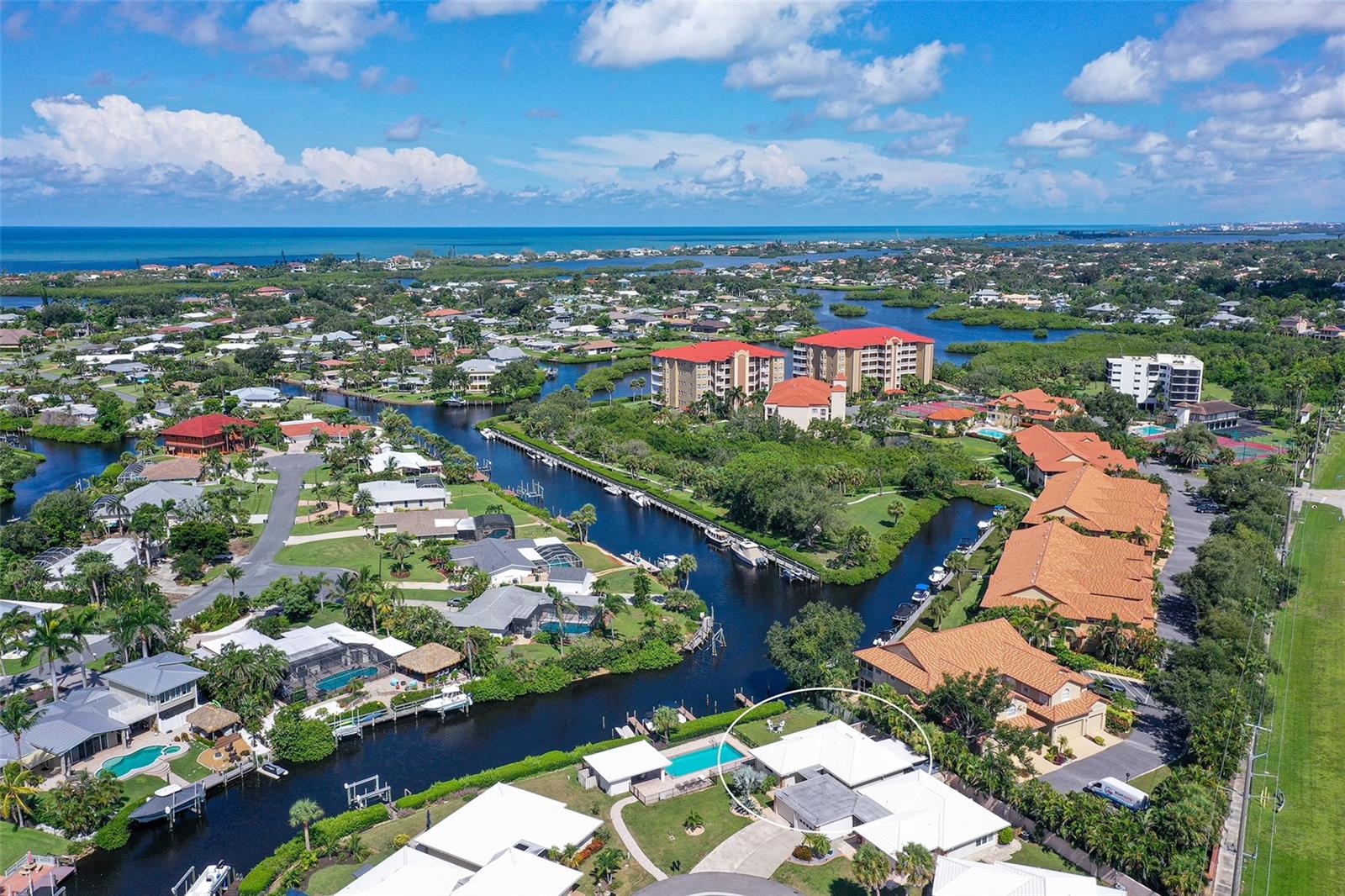 Under contract-accepting backup offers. Bring your boat and move right in! This home has been completely gutted and rebuilt from the ground up with nothing left untouched. Every finish, fixture, and feature has been carefully chosen with quality in mind. Offering a direct canal view, and just steps from the heated community pool, this property blends luxury living with a relaxed coastal lifestyle.
Inside, enjoy the peace of mind of all new electric, plumbing, duct work, insulation, and a high-impact garage door. High-impact windows frame water views, while the French doors in the master suite lead to the private community yard. The kitchen is a chef’s dream, featuring granite countertops, soft-close cabinetry, new appliances (2022), and a kitchen exhaust vented to the outside. Bathrooms are elegantly updated with quartz countertops, lighted mirrors, and premium finishes. Unlike other units in the community, this property boasts a full-service laundry room, complete with a prep sink and custom storage cabinets. Additional highlights include a reverse osmosis water filtration system, automatic sun shade, new fans and lighting, and a cut coral accent wall in the entry.
The well-maintained AC (2019) and hot water heater (2020) ensure comfort year-round. Located in an unbeatable location, right off US-41, keeps you close to Sarasota’s best restaurants, shopping, and attractions. An unparalleled value, with community boat docks available for a small monthly fee, you can cruise out to the Intracoastal with ease, with no fixed bridges separating you and the Gulf. Opportunities like this don't last - schedule your appointment today to see this rare gem before it's gone!