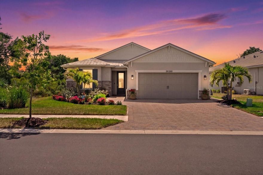 Thoughtfully positioned within today’s market, this stunning residence now offers an even more compelling opportunity for buyers to own one of the most extensively upgraded homes in BeachWalk by Manasota Key, without the wait, uncertainty, or added expense of new construction. 

Built in 2024 and set on a private preserve homesite, this move-in-ready Smart Home stands apart with over $100,000 in post-construction upgrades already completed—features that would be costly and time-consuming to replicate today.

Designed for both everyday comfort and elevated entertaining, the home showcases a bright, open floor plan with wood-look tile throughout, crown molding, tray ceilings, 8’ doors, and a seamless indoor-outdoor flow through zero-corner sliding glass doors. The main living area is a true focal point, featuring a custom shiplap accent wall, electric fireplace with custom mantel, and integrated Sonos surround sound.

The gourmet kitchen is both functional and refined, offering quartz countertops, natural gas cooktop, custom hood, large island, walk-in pantry, and soft-close cabinetry with thoughtful storage throughout.

The primary suite provides a private retreat with tray ceiling, custom accent wall, and a fully built-out walk-in closet, along with a spa-inspired bath featuring dual vanities, soaking tub, and a walk-in shower with floor-to-ceiling tile.

Step outside to a fully customized outdoor living space designed for the Florida lifestyle—complete with a heated PebbleTec saltwater pool and spa, expansive travertine decking, built-in outdoor kitchen, tongue-and-groove ceiling, and upgraded no-see-um screening, all overlooking a tranquil preserve for exceptional privacy.

Beyond the finishes, this home delivers true peace of mind with a metal roof, hurricane impact windows, Storm Smart shutters, whole-house 22kW generator with surge protection, and a carbon water filtration system—features rarely found together in comparable homes.

Additional recent upgrades include plantation shutters throughout, custom primary closet system, garage mini-split A/C, insulated garage door, widened driveway and walkway, and enhanced landscaping with uplighting.

Located in the highly desirable BeachWalk by Manasota Key community—featuring no CDD, low HOA fees, and resort-style amenities including clubhouse, fitness center, resort style pool, pickleball, , bocci, tennis, dining, and more—this 3 bedroom home offers the ideal combination of luxury, privacy, and convenience just minutes from Gulf beaches, golf, and boating.

With premium upgrades already in place and a newly improved price, this home represents a rare opportunity to step directly into the Florida coastal lifestyle without the wait, stress, or higher cost of new construction. This is truly one of the best values currently available in the community.