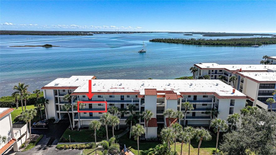 Experience the ultimate Florida coastal lifestyle in this stunning, fully renovated 2-bedroom, 2-bathroom condo located at 1591 Beach Rd, Unit #202. Spanning a comfortable 1,070 square feet, this residence offers an exceptional blend of modern luxury and serene natural beauty, featuring sweeping views of Lemon Bay and the Intracoastal Waterway. Every detail of the interior has been thoughtfully updated to provide a move-in-ready experience that captures the essence of sophisticated island living.
The heart of the home is the designer kitchen, which has been completely transformed with sleek granite countertops, elegant new cabinetry, and a full suite of modern appliances installed in 2022. Durable and stylish tile flooring flows throughout the entire living space, complementing the light and airy coastal aesthetic of the bedrooms and living areas. Beyond the aesthetics, this unit offers incredible peace of mind with a brand-new AC system and a new hot water heater both installed in 2024, ensuring high-efficiency comfort for years to come.

Perhaps the most captivating feature of this property is the expansive outdoor patio. This large private space overlooks the sparkling waters of the bay, offering a front-row seat to spectacular sunrises and local wildlife, including dolphins and manatees. It is the perfect setting for morning coffee or evening relaxation while enjoying the gentle salt air.

Situated in a prime location on Manasota Key, this condo provides unparalleled access to the best of Englewood. You are within easy walking distance to the pristine sands of Englewood Beach, as well as an array of popular local restaurants, lively tiki bars, and charming boutiques. The community itself enhances the vacation-style atmosphere, offering residents access to heated bayfront pools and beautifully maintained grounds. Whether you are looking for a permanent residence or a seasonal retreat, this waterfront gem represents the pinnacle of Southwest Florida real estate.