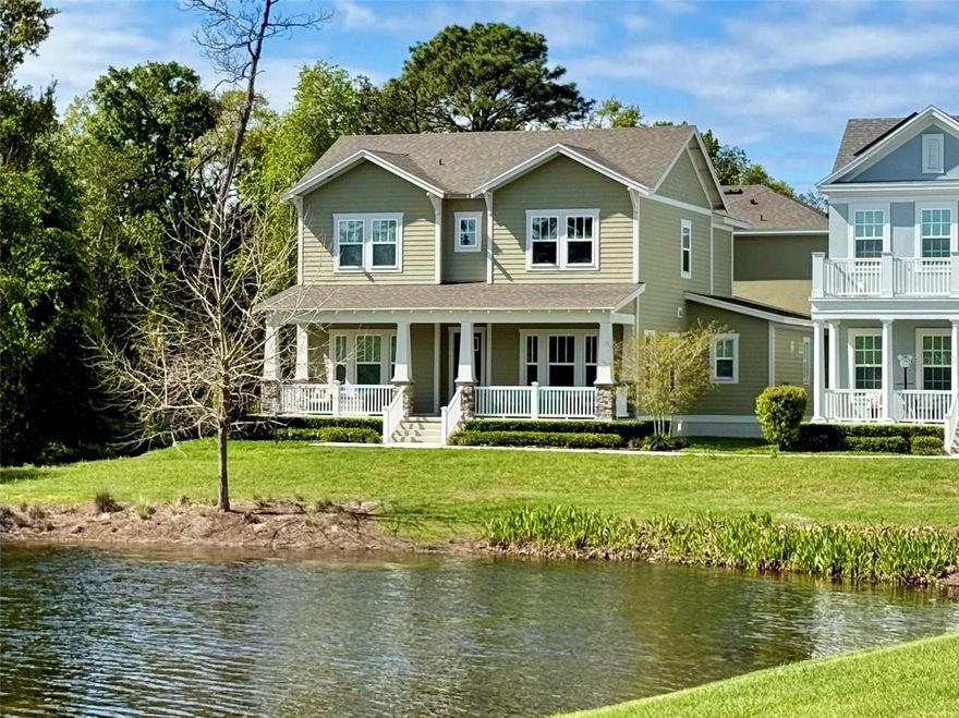 Privacy like this is rarely found in Celebration! Located in Island Village, this beautifully built 2023 home enjoys an exceptional setting with a tranquil pond view from the front and conservation bordering one side—creating a level of privacy difficult to find not only in Island Village, but throughout Celebration. Inside, the home offers six bedrooms and four bathrooms with a spacious, thoughtfully designed floor plan filled with natural light. The open living areas create a comfortable flow for everyday living while also providing generous space for entertaining. The kitchen is complemented by an oversized walk-in pantry offering exceptional storage and organization. Just inside the entry from the garage, a convenient drop zone provides the perfect place for bags, shoes, and everyday essentials. A downstairs bedroom with a full bathroom offers flexibility for guests, multi-generational living, or a private home office. Upstairs, the primary suite is joined by three additional bedrooms, providing ample space for family, visitors, or work-from-home needs. The home also features double-paned windows for added energy efficiency and comfort, along with a gas tankless hot water heater providing efficient, on-demand hot water. The property’s location at the end of the alley adds another rare benefit. Behind the garage, a dedicated parking pad provides additional parking exclusively for this home—an uncommon feature in Celebration that adds convenience for guests and everyday living. The garage has been thoughtfully and recently upgraded with a professionally installed polyurea floor coating—stronger and more flexible than traditional epoxy—designed for maximum adhesion and long-term durability. It also features adjustable wall storage racks, ceiling-mounted storage systems, and a 220V EV outlet, creating a highly functional and well-organized workspace. To top it off, above the garage a private one-bedroom apartment provides outstanding flexibility for guests, extended family, or potential rental income. Celebration offers miles of walking and biking trails, multiple community pools, parks, playgrounds, dog parks, golf, tennis, seasonal events, farmers markets, and a vibrant downtown filled with boutique shopping and dining. Located just minutes from Walt Disney World, major attractions, shopping, and entertainment—and with convenient access to Orlando International Airport—this home offers the perfect balance of peaceful neighborhood living and everyday convenience. Schedule your private showing today!